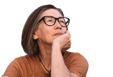 A woman with glasses posing with her hand under her chin looking into the distance